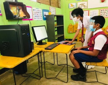 Computer and a Photo Copy Machine  for Sirikanduyaya  School